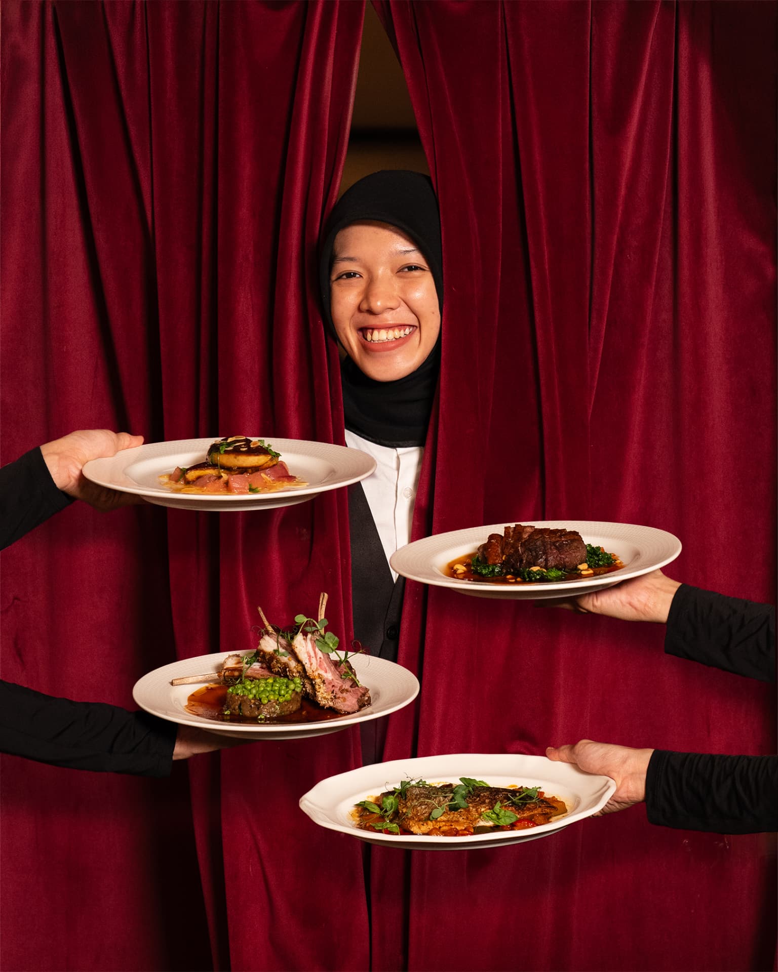 Emir Brasserie service team presenting summer dishes